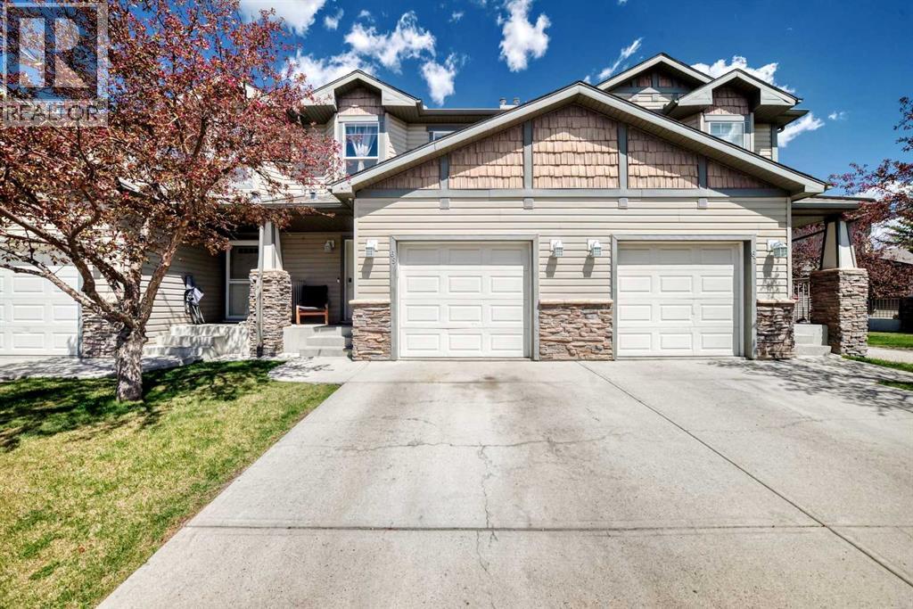 65 Spring Meadows Bay, Okotoks, Alberta  T1S 2G8 - Photo 3 - A2312954