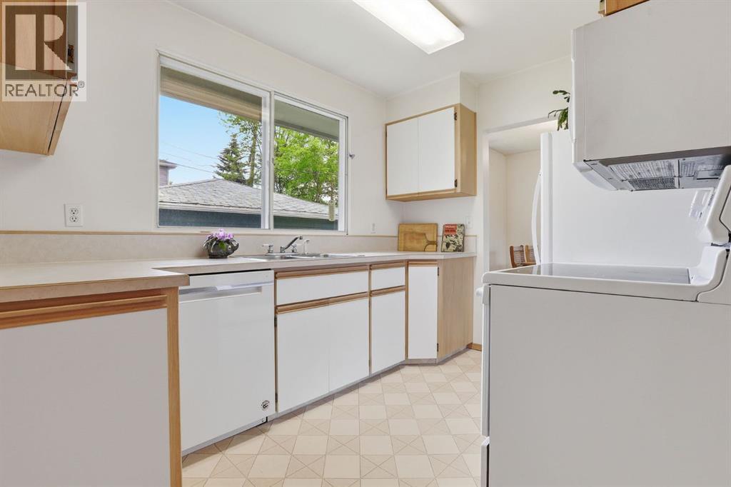 908 30 Avenue NW, Calgary, Alberta  T2K 0A1 - Photo 16 - A2332469