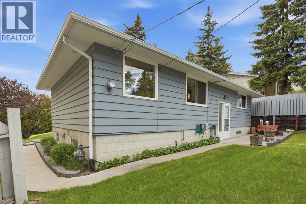 908 30 Avenue NW, Calgary, Alberta  T2K 0A1 - Photo 30 - A2332469