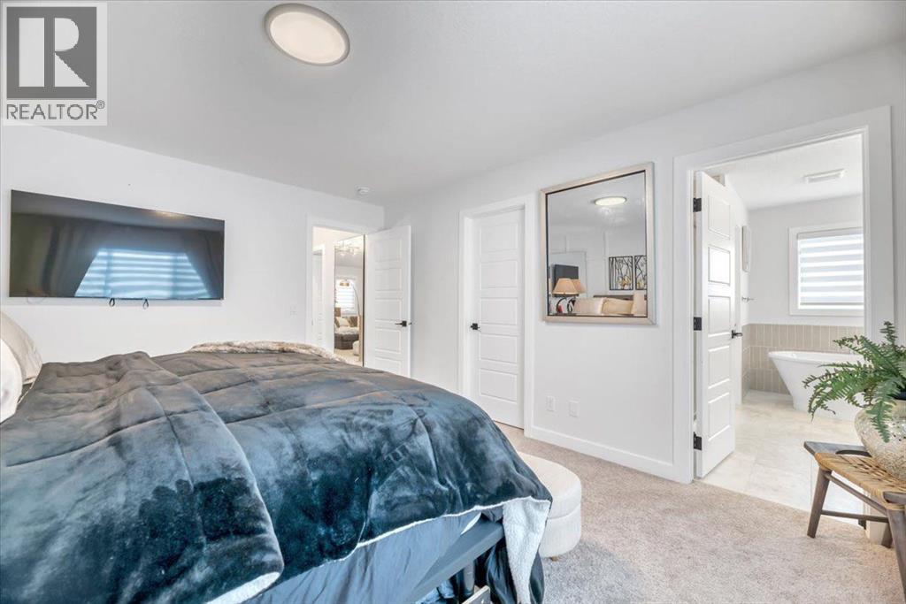 77 Versant Point SW, Calgary, Alberta  T2Z 0Z5 - Photo 25 - A2333907