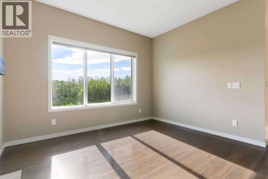 638 River Heights Crescent, Cochrane, Alberta  T4C 0R9 - Photo 22 - A2333589