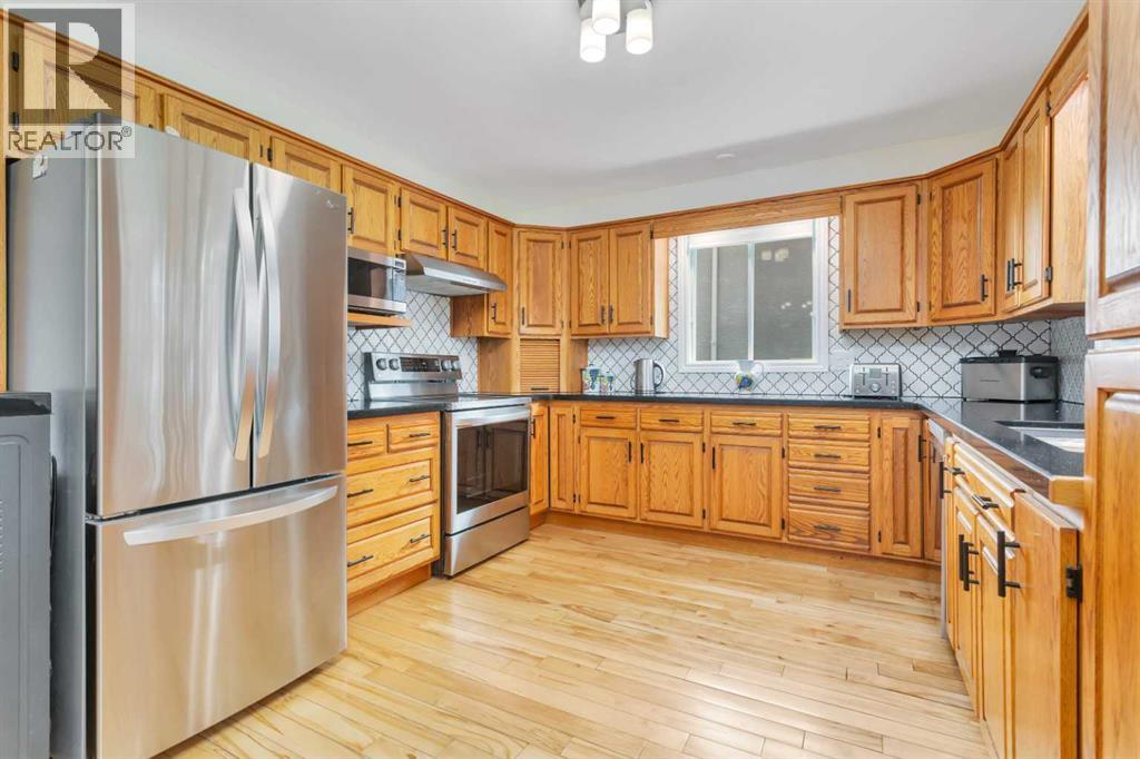 5108 49 Street, Clive, Alberta  T0C 0Y0 - Photo 7 - A2325429