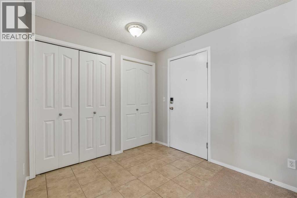 7207, 304 Mackenzie Way SW, Airdrie, Alberta T4B 3H7 - Photo 4 - A2330496