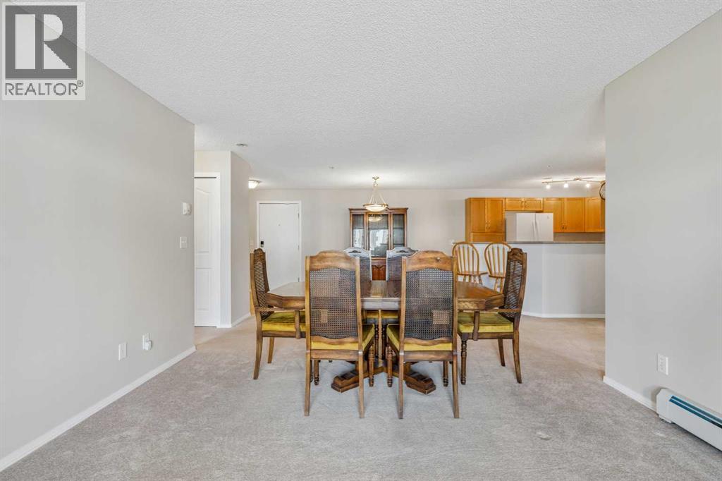 7207, 304 Mackenzie Way SW, Airdrie, Alberta T4B 3H7 - Photo 12 - A2330496