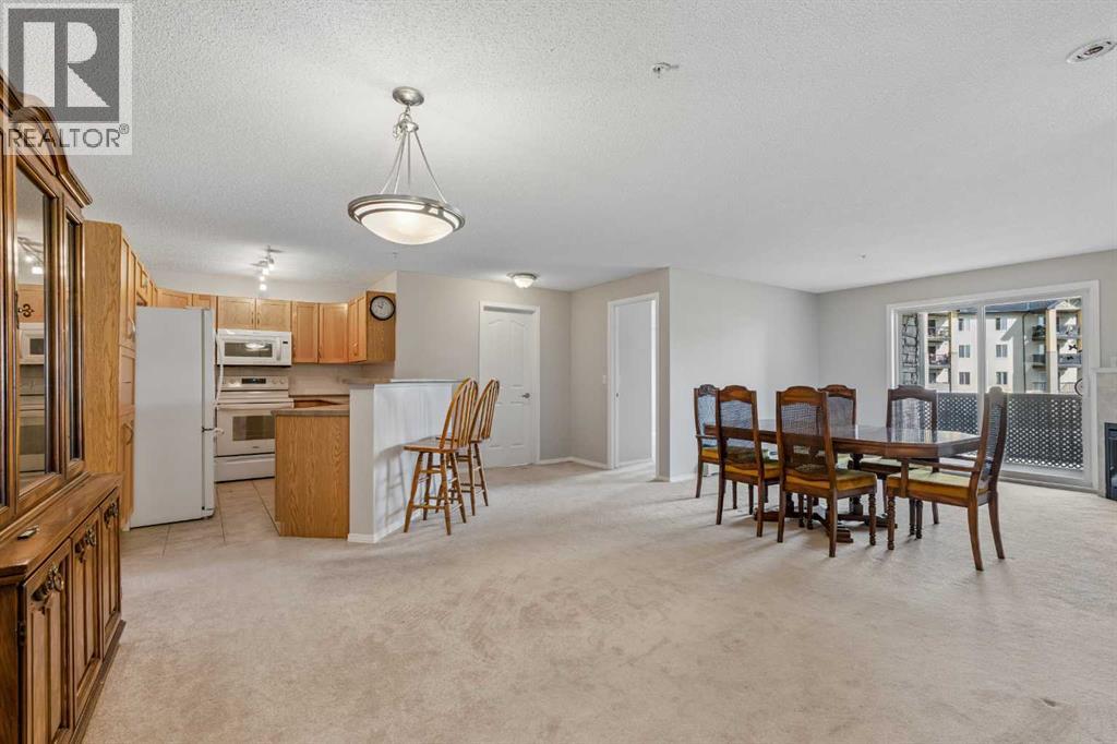 7207, 304 Mackenzie Way SW, Airdrie, Alberta T4B 3H7 - Photo 5 - A2330496