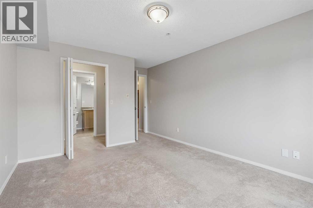 7207, 304 Mackenzie Way SW, Airdrie, Alberta T4B 3H7 - Photo 18 - A2330496