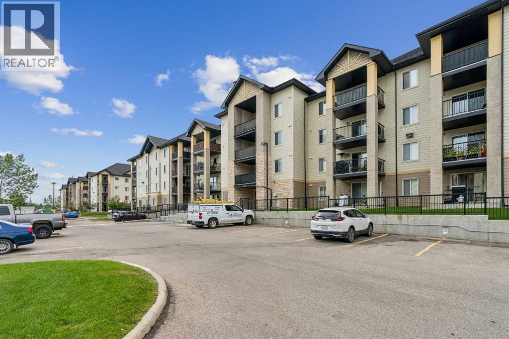 7207, 304 Mackenzie Way SW, Airdrie, Alberta T4B 3H7 - Photo 1 - A2330496