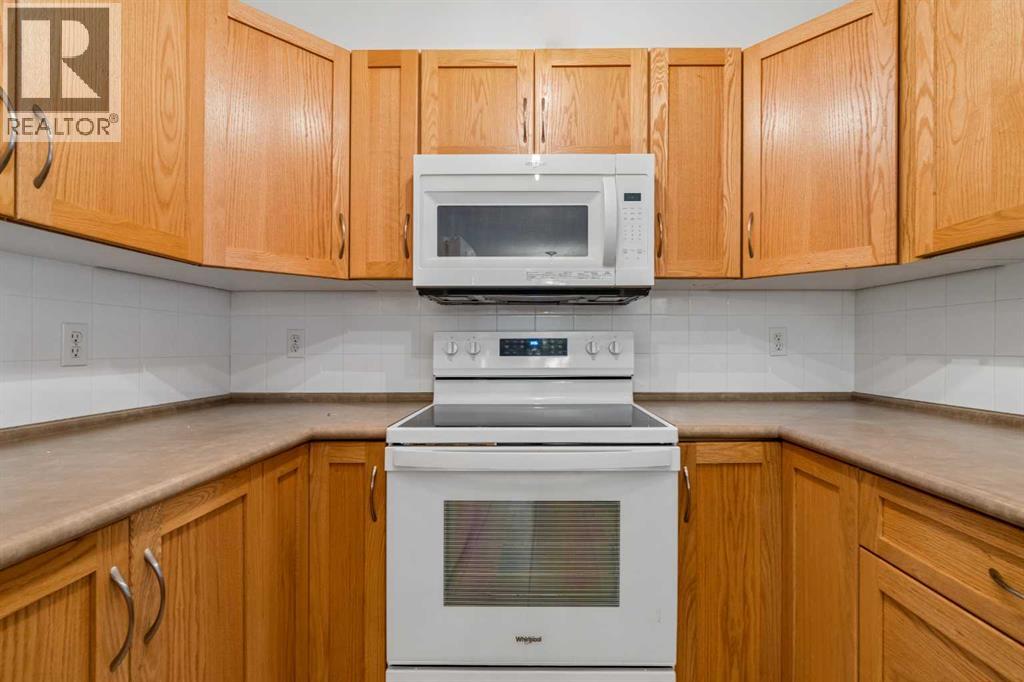 7207, 304 Mackenzie Way SW, Airdrie, Alberta T4B 3H7 - Photo 10 - A2330496