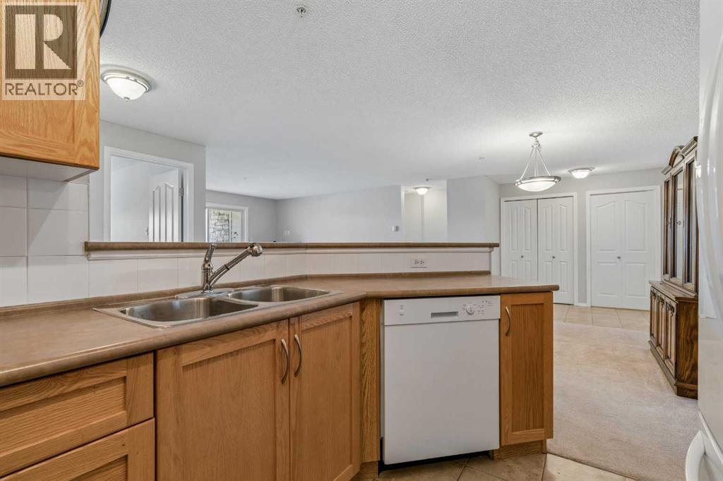 7207, 304 Mackenzie Way SW, Airdrie, Alberta T4B 3H7 - Photo 11 - A2330496