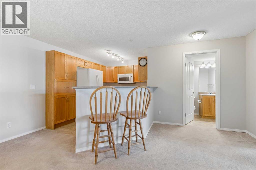 7207, 304 Mackenzie Way SW, Airdrie, Alberta T4B 3H7 - Photo 7 - A2330496