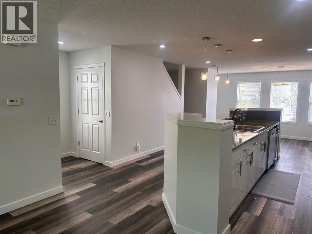 78 Crystal Shores Heights, Okotoks, Alberta  T1S 2K9 - Photo 6 - A2318337