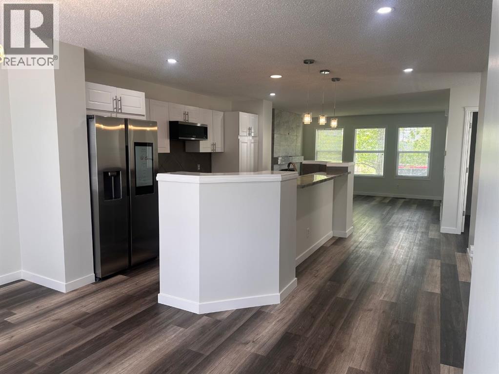 78 Crystal Shores Heights, Okotoks, Alberta  T1S 2K9 - Photo 14 - A2318337