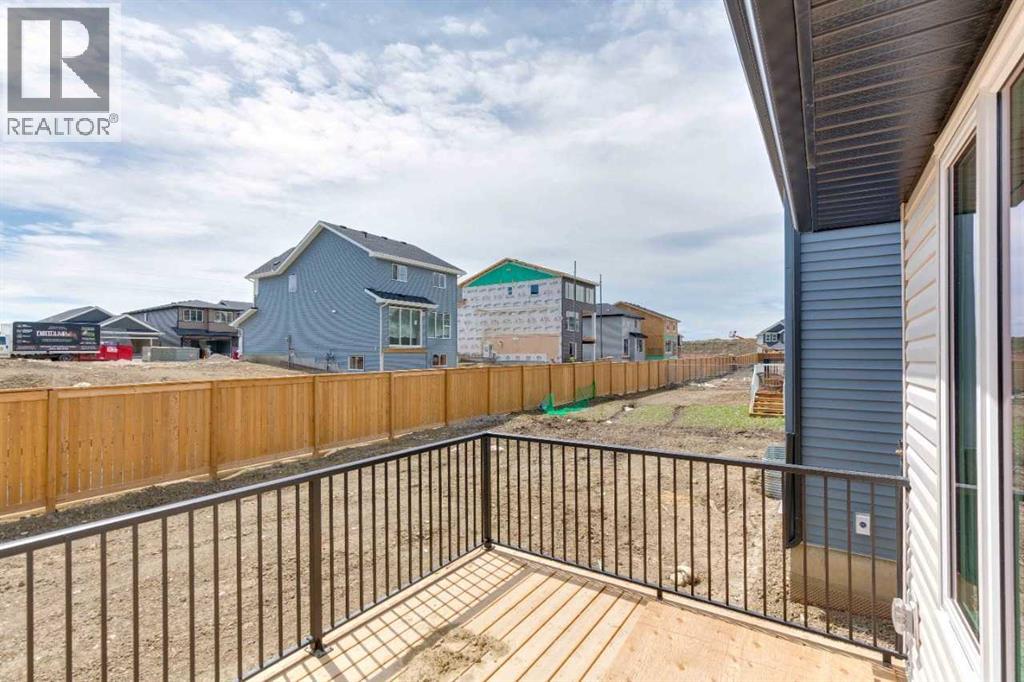 73 Southborough Square, Cochrane, Alberta  T4C 3J7 - Photo 32 - A2311690