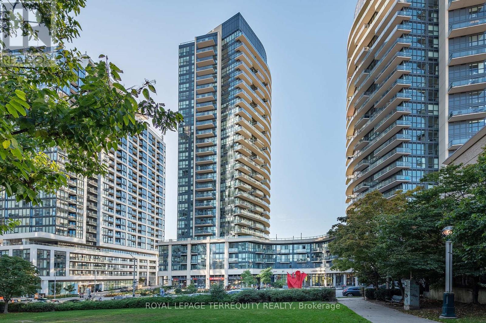"Liberty Central by the Lake Two". Wonderful, Unobstructed Views of the Lake and Porter Airport Runway. Welcome to your urban oasis in the heart of trendy liberty village. This spacious two bedroom two washroom unit offers the perfect blend of modern living and convenience. Enjoy the breathtaking unobstructed views of the lake from your balcony. Corner unit with 763 square feet of refined living space and a 60 square foot open balcony. (From Builders Plan). Open concept main room features two sides window and a kitchen with stainless appliances and granite corner. Minutes away from Bustling Liberty Village Shops, Restaurants, Grocery stores, Parks, GO Train, Transit and Easy highway access. Exceptional Amenities: Roof Top Patio, Outdoor pool, Guest Suites, Gym, Media Room, Party Room, Concierge and visitor Parking. A Fantastic Suite and Community. (id:48254)