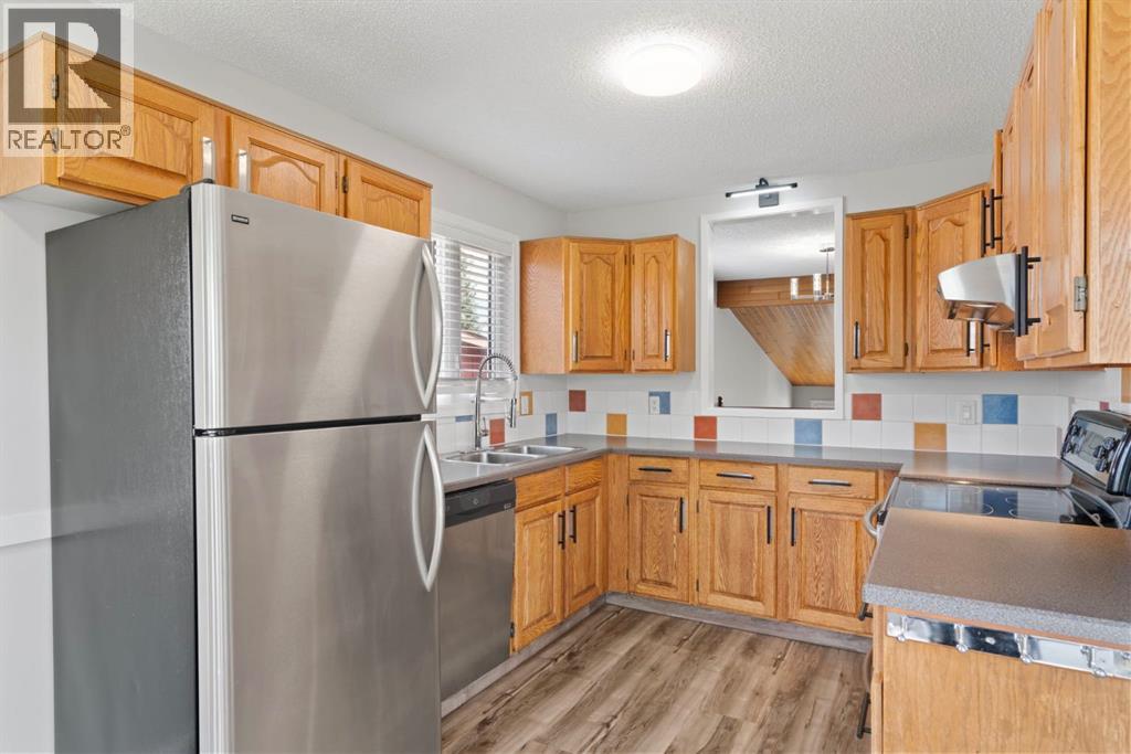 92 Glenhill Drive, Cochrane, Alberta  T4C 1H1 - Photo 5 - A2310605