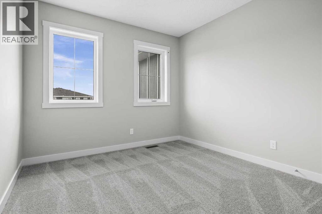 55 Agate Road, Cochrane, Alberta  T4C 3B9 - Photo 15 - A2329006
