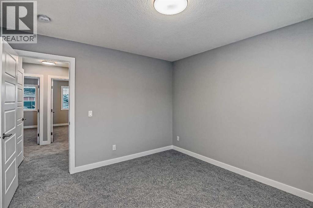 55 Agate Road, Cochrane, Alberta  T4C 3B9 - Photo 38 - A2329006