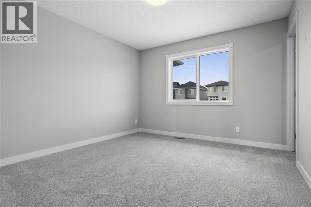 55 Agate Road, Cochrane, Alberta  T4C 3B9 - Photo 11 - A2329006