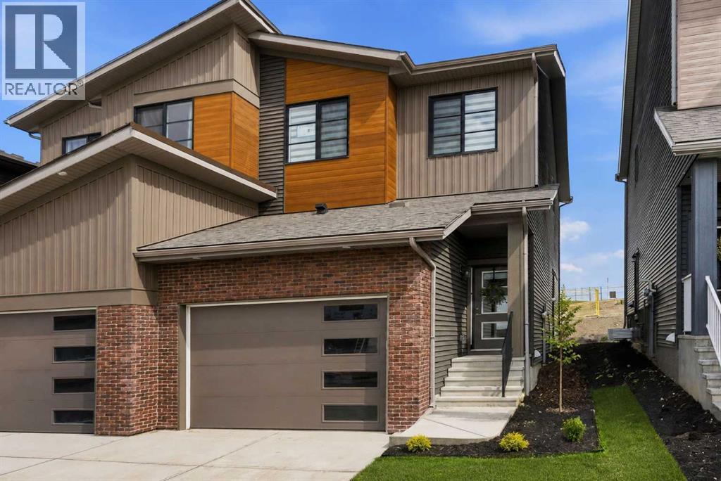 55 Heritage Manor, Cochrane, Alberta T4C 3K7 - Photo 2 - A2314683