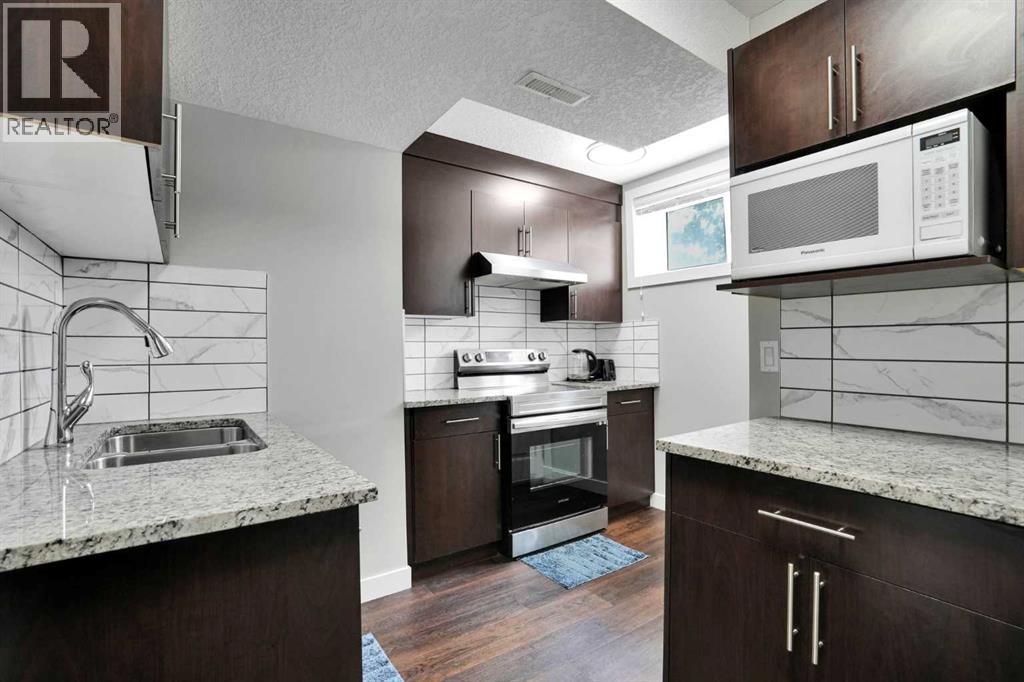 49 Sherwood Gate NW, Calgary, Alberta  T3R 0N9 - Photo 48 - A2330979