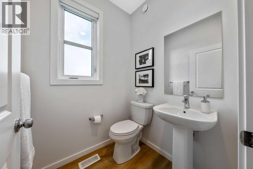 86 Spring Willow Close SW, Calgary, Alberta  T3H 6E8 - Photo 4 - A2326586