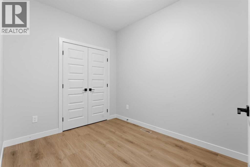 3081 Key Drive SW, Airdrie, Alberta  T4B 5T1 - Photo 5 - A2328614