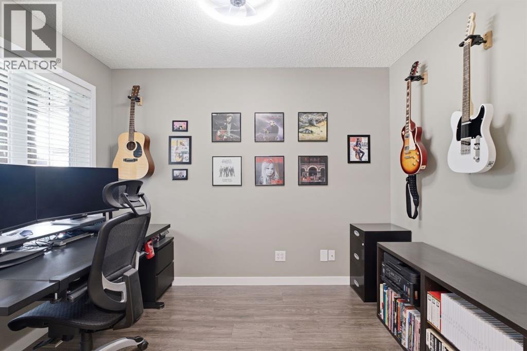132 Coopers Heights SW, Airdrie, Alberta  T4B 2S1 - Photo 7 - A2328326