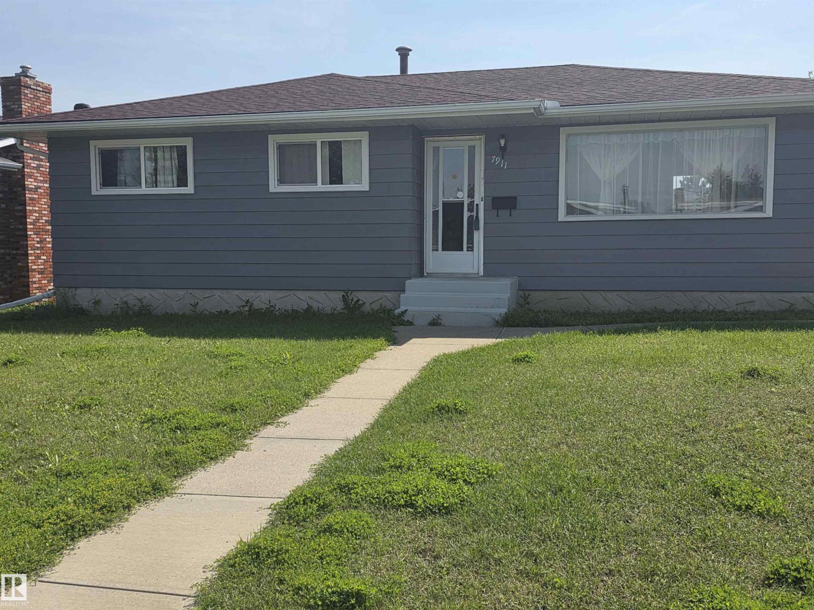 7911 145 Av NW NW, Edmonton, Alberta  T5C 2S8 - Photo 2 - E4501836
