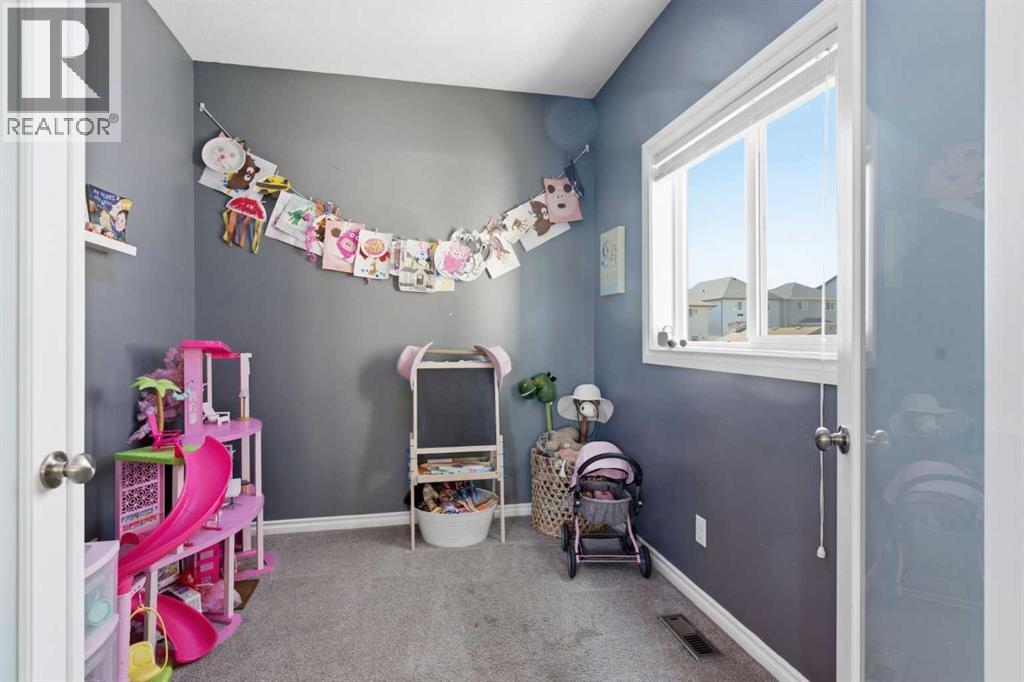 31 Reunion Grove NW, Airdrie, Alberta  T4B 0Y9 - Photo 7 - A2332773