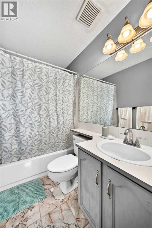 89 Bedford Manor NE, Calgary, Alberta  T3K 4B8 - Photo 21 - A2324015