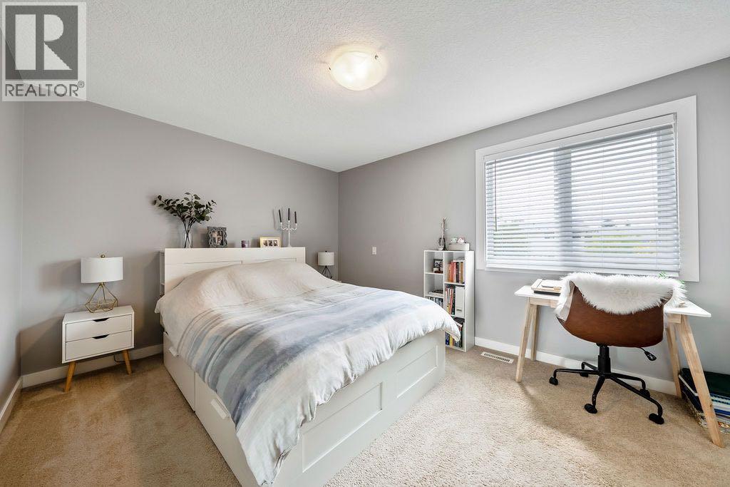 15 Woodmont Green Sw, Calgary, Alberta  T2W 4Z3 - Photo 23 - A2321617