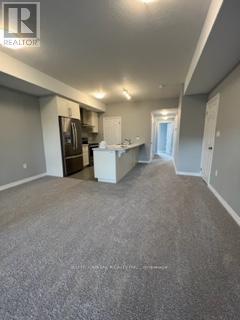 114 Oat Lane, Kitchener, Ontario  N2R 0S8 - Photo 3 - X13630338