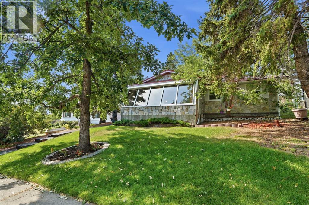 13 Tipton Place NW, Calgary, Alberta  T2K 3L6 - Photo 5 - A2333948