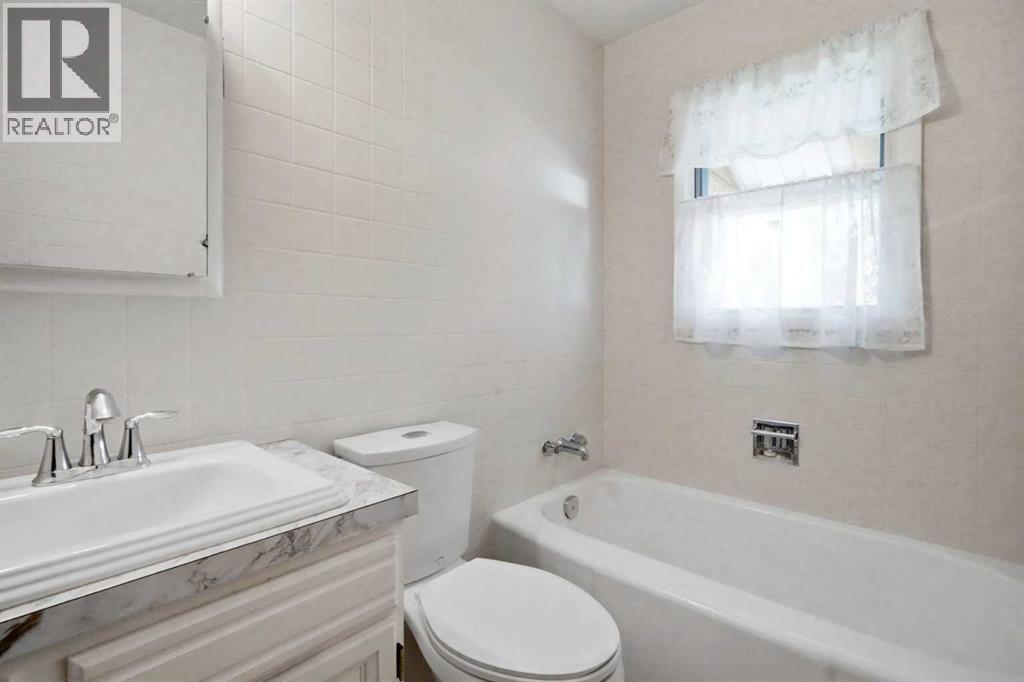 13 Tipton Place NW, Calgary, Alberta  T2K 3L6 - Photo 21 - A2333948