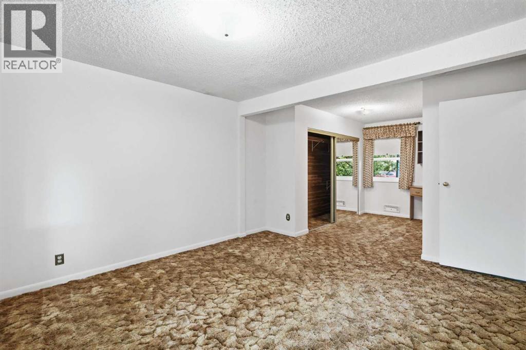 13 Tipton Place NW, Calgary, Alberta  T2K 3L6 - Photo 15 - A2333948