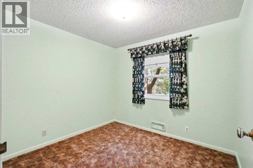 13 Tipton Place NW, Calgary, Alberta  T2K 3L6 - Photo 19 - A2333948