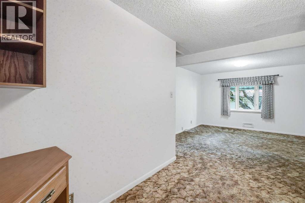 13 Tipton Place NW, Calgary, Alberta  T2K 3L6 - Photo 17 - A2333948