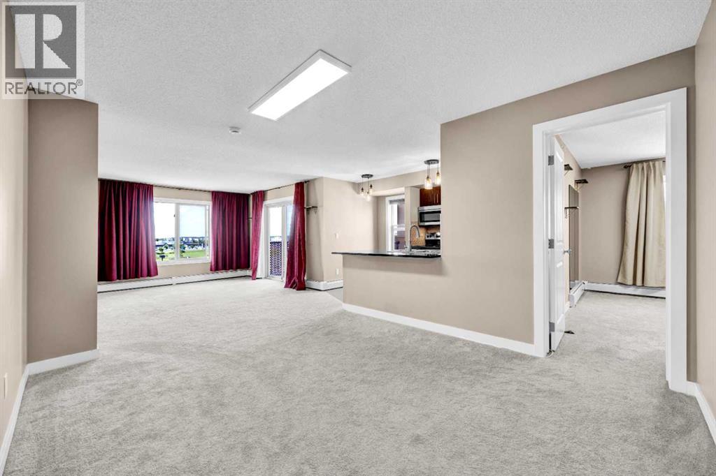 7411, 403 Mackenzie Way SW, Airdrie, Alberta T4B 3V7 - Photo 12 - A2331317