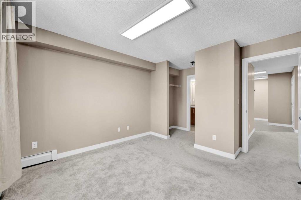 7411, 403 Mackenzie Way SW, Airdrie, Alberta T4B 3V7 - Photo 31 - A2331317