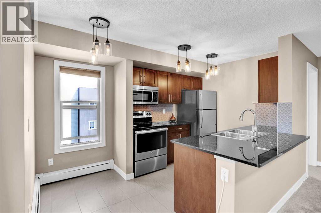 7411, 403 Mackenzie Way SW, Airdrie, Alberta T4B 3V7 - Photo 24 - A2331317