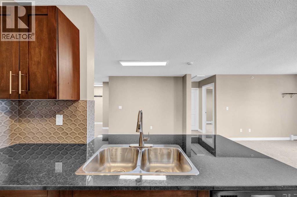7411, 403 Mackenzie Way SW, Airdrie, Alberta T4B 3V7 - Photo 26 - A2331317