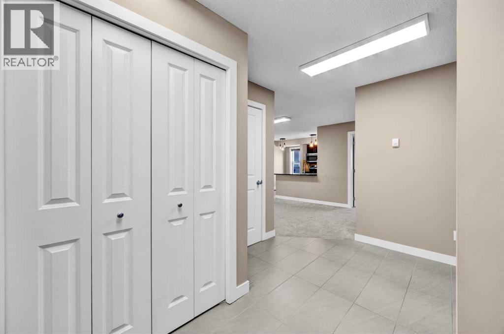 7411, 403 Mackenzie Way SW, Airdrie, Alberta T4B 3V7 - Photo 8 - A2331317
