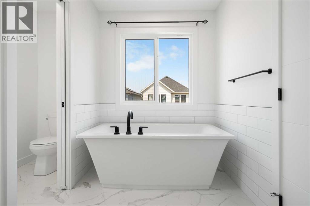 12 Copperhead Garden Se, Calgary, Alberta T2Z 5H1 - Photo 35 - A2333989