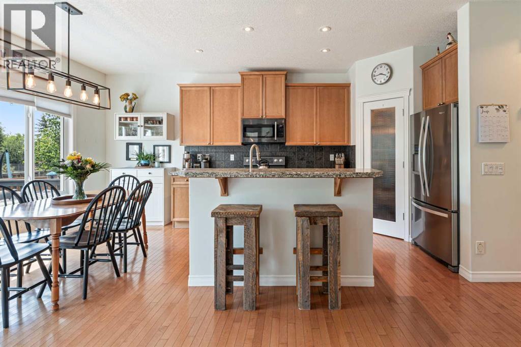 7 Crystal Green Way, Okotoks, Alberta  T1S 2K5 - Photo 9 - A2331506