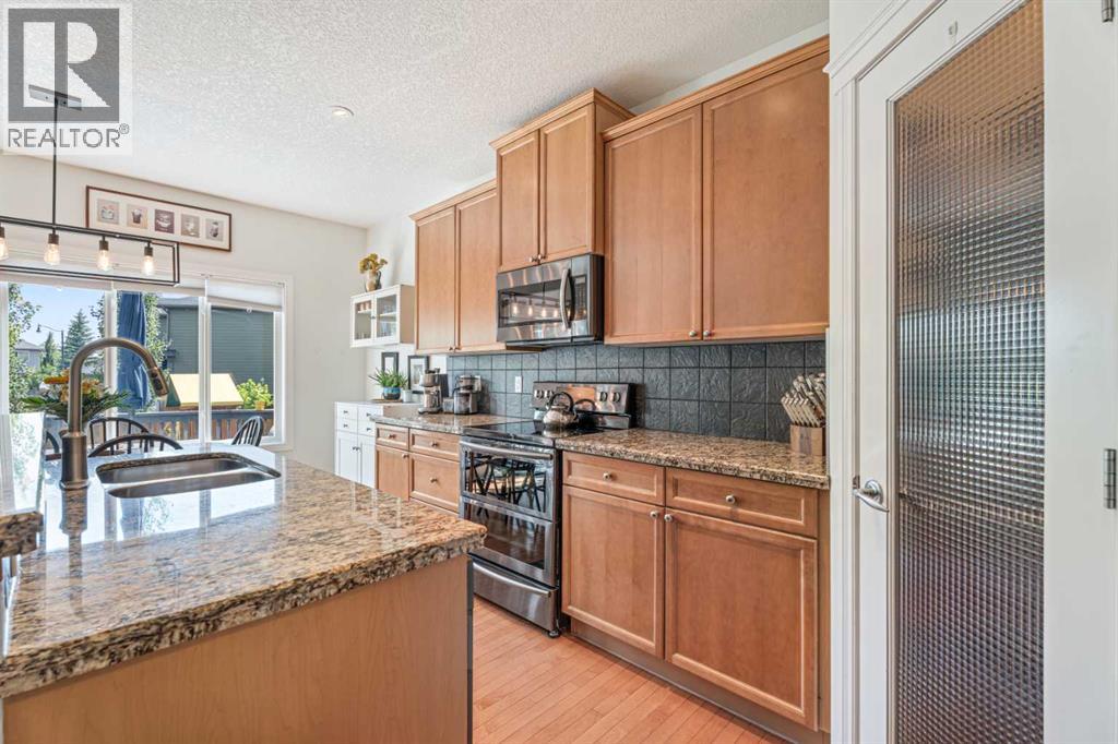 7 Crystal Green Way, Okotoks, Alberta  T1S 2K5 - Photo 10 - A2331506