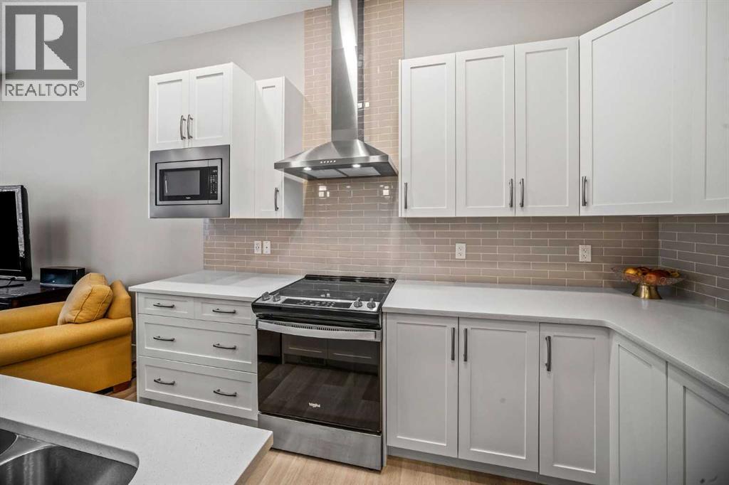 210 Crestbrook Common SW, Calgary, Alberta  T3B 6L1 - Photo 11 - A2325384
