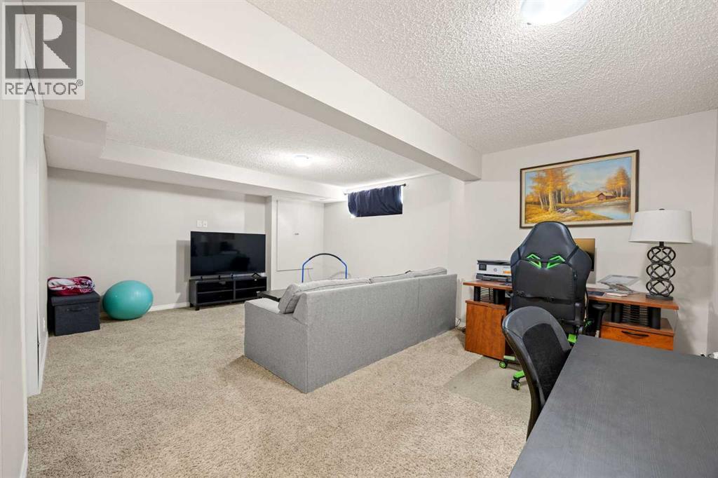 76 Crystal Shores Heights, Okotoks, Alberta  T1S 2K9 - Photo 31 - A2306208