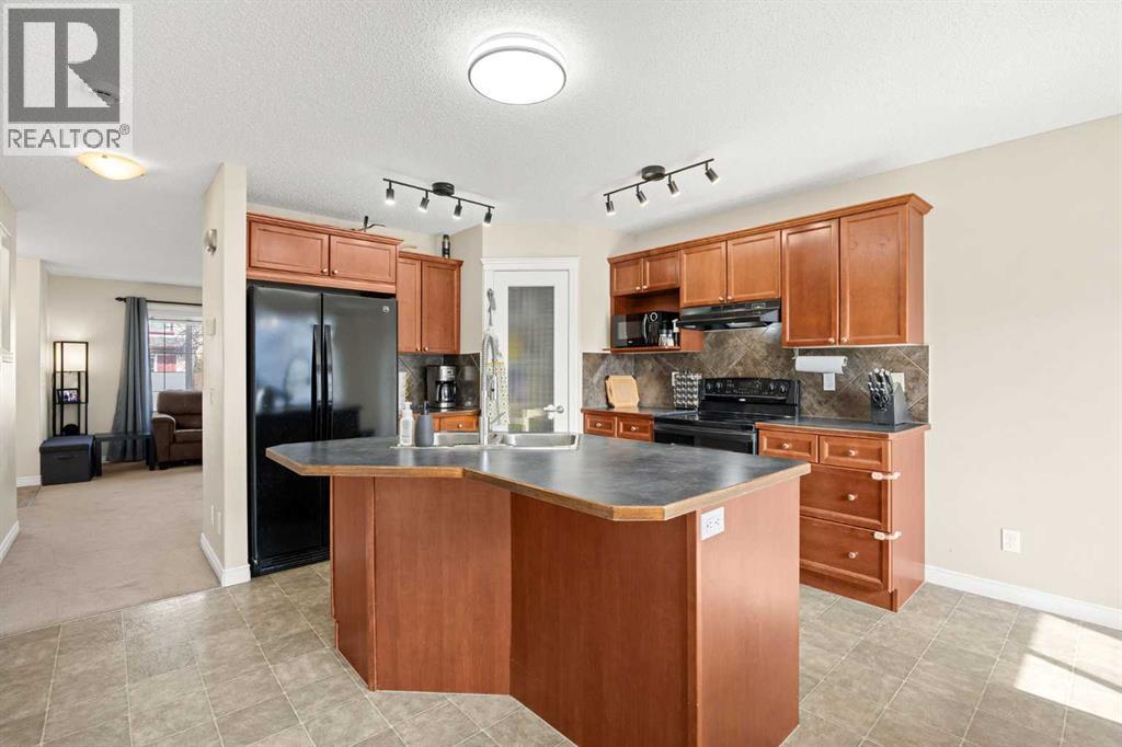 76 Crystal Shores Heights, Okotoks, Alberta  T1S 2K9 - Photo 11 - A2306208