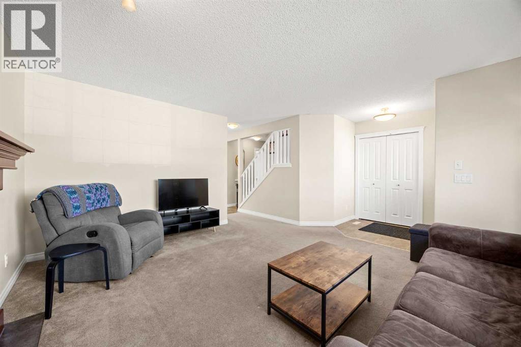 76 Crystal Shores Heights, Okotoks, Alberta  T1S 2K9 - Photo 6 - A2306208