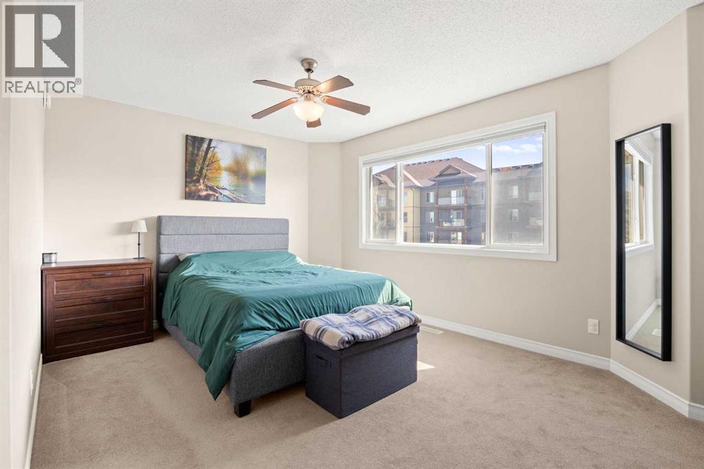 76 Crystal Shores Heights, Okotoks, Alberta  T1S 2K9 - Photo 23 - A2306208